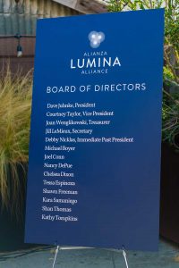 Lumina Alliance poster board with a list of the Board of directors below.