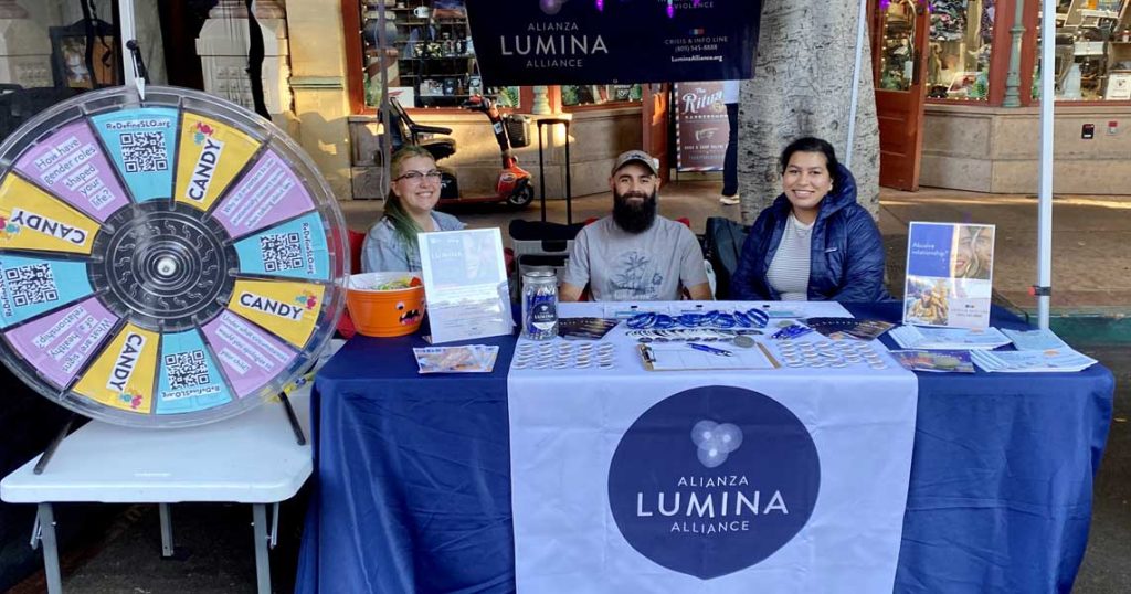 Lumina staff pictured tabling at an event.